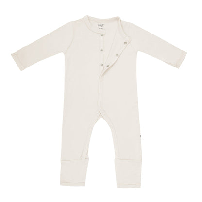 Kyte Baby Snap Romper in Oat unsnapped from the top