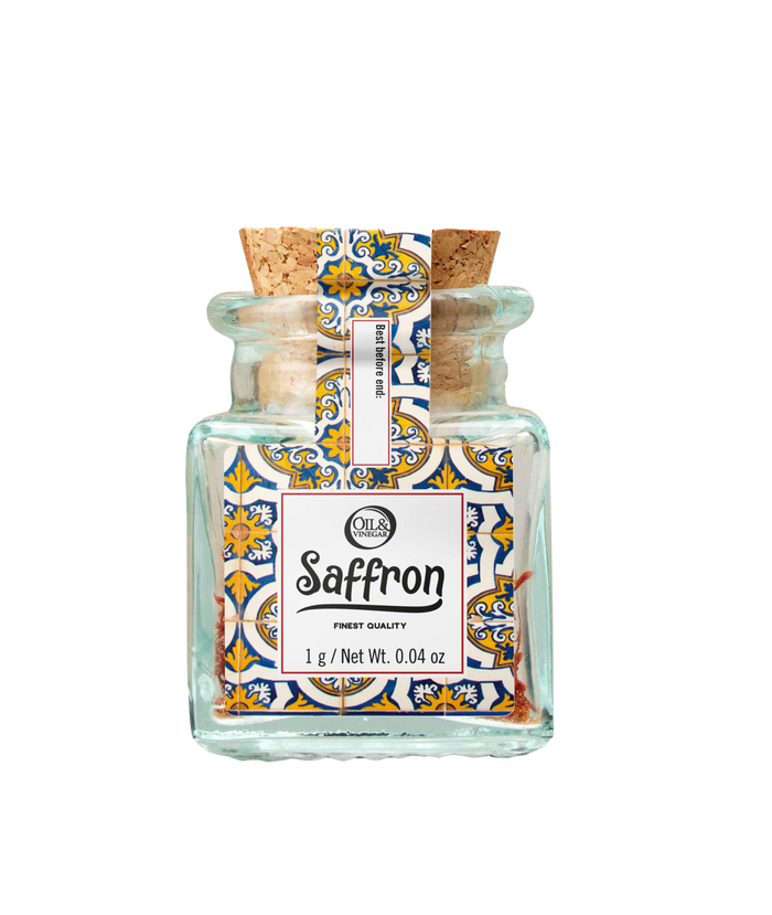 jar of saffron with decorative label on a white background