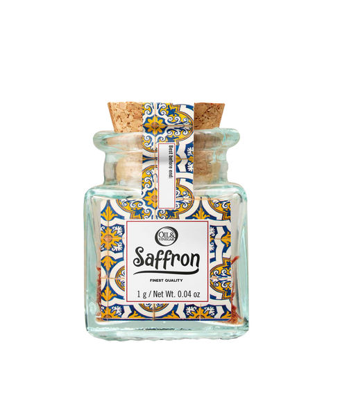 jar of saffron with decorative label on a white background