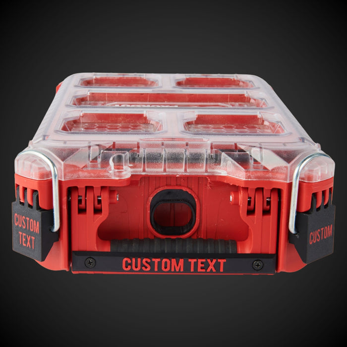Red milwaukee organizer with customizable Screw_On_Label on a dark background