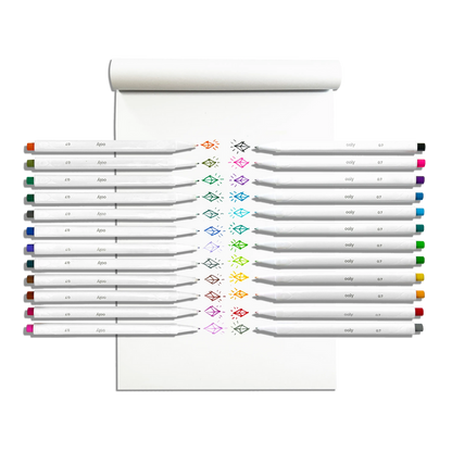 Row of markers with colored diamond swatches on a white pad made with a set of OOLY Seriously Fine Tip Markers