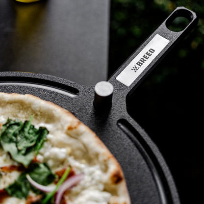 This is an image of the Breeo Serving Board with pizza