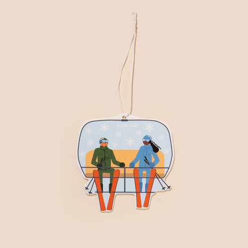 Car freshener on a cream colored background