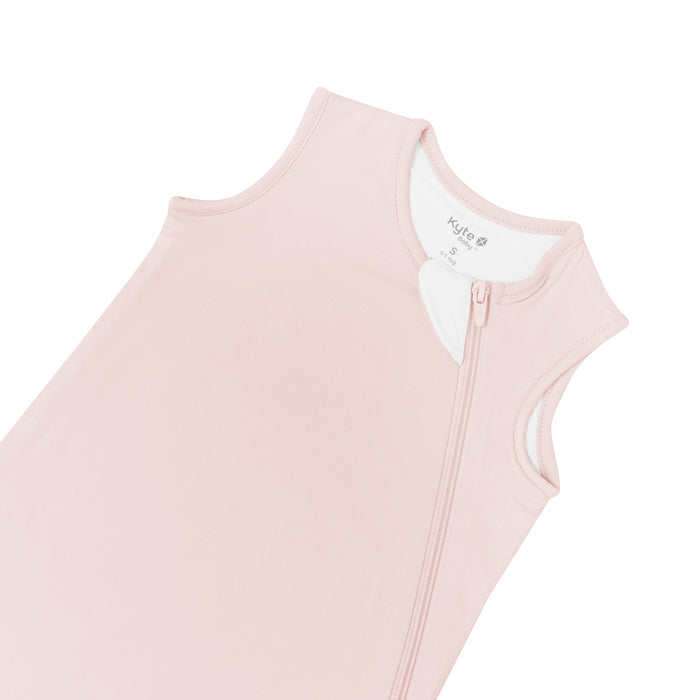 Close up of zipper garage on Kyte Baby Sleep Bag in Blush 0.5