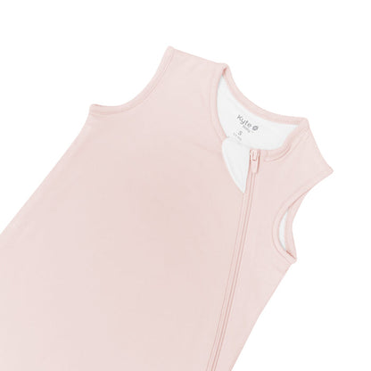 Close up of zipper garage on Kyte Baby Sleep Bag in Blush 0.5