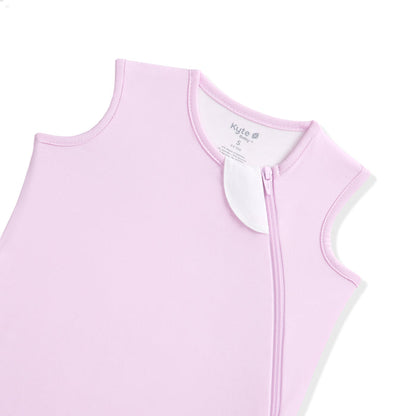 Light purple sleeveless baby sleep bag with a zipper on a white background