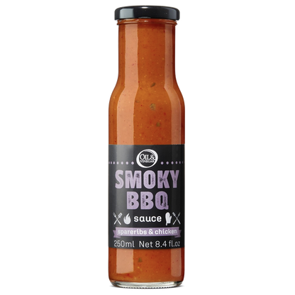 A bottle of Smoky Grill BBQ sauce with a label showing the product name and volume.