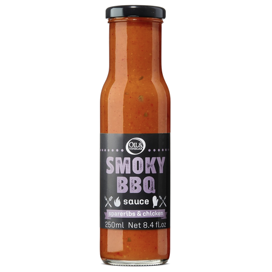 A bottle of Smoky Grill BBQ sauce with a label showing the product name and volume.