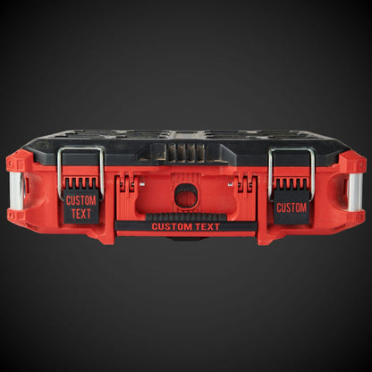 Red and black tool organizer with customizable text on a dark background