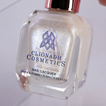 Close-up, angled shot of Spirit Nail Lacquer bottle on a white background.