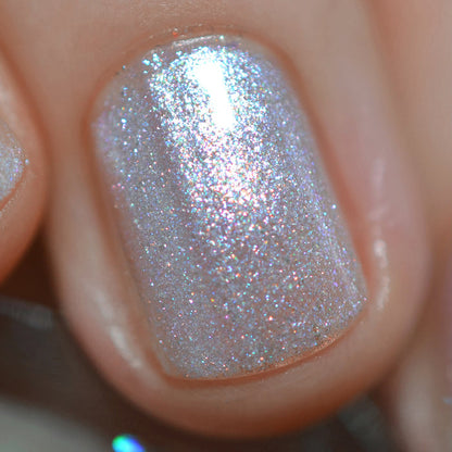 Close-up of one nail painted with Spirit Nail Lacquer on fair skin tone.