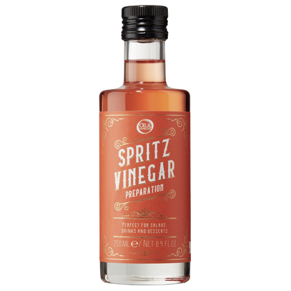 A bottle labeled Spritz Vinegar with a capacity indicator of 250 ml/8.4 fl oz.