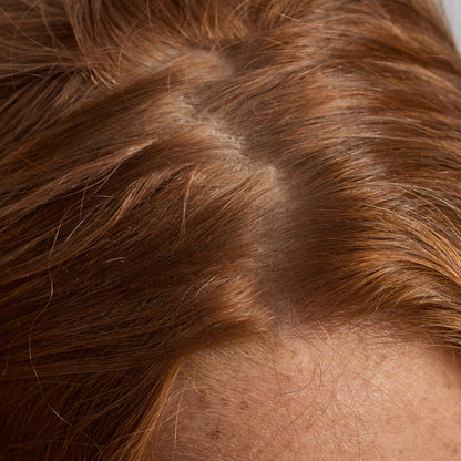 KITSCH Strengthening Rosemary & Biotin Scalp & Hair Oil 0.34fl oz./10mL — before shot of model hair — 100% plant-based oil formulated with rosemary extract and biotin — therapeutic lavender scent invites you to relax & indulge in an at-home spa moment