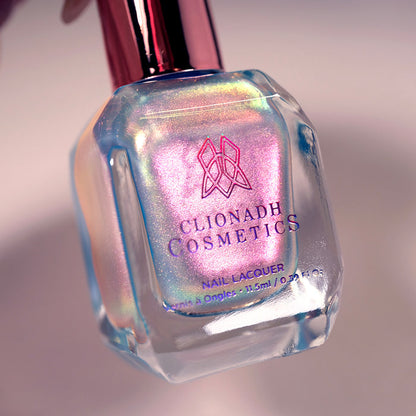 Close-up, angled shot of Tessera  Nail Lacquer bottle on a white background.
