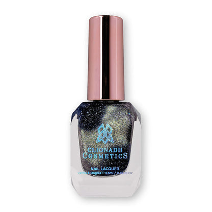 Bottle of nail polish containing Tombstone Nail Lacquer on white background.