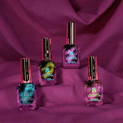 Four bottles of Clionadh Cosmetics nail polish standing on a purple fabric background.