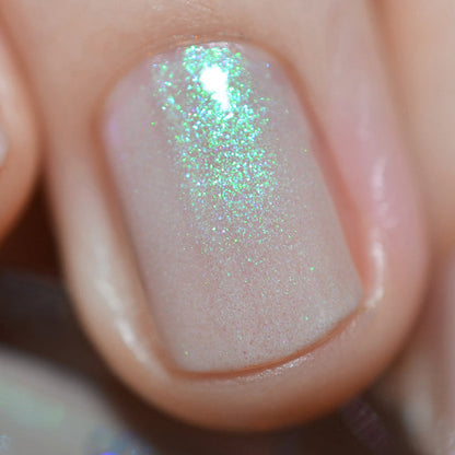 Close-up of one nail painted with Venus Nail Lacquer on fair skin tone.