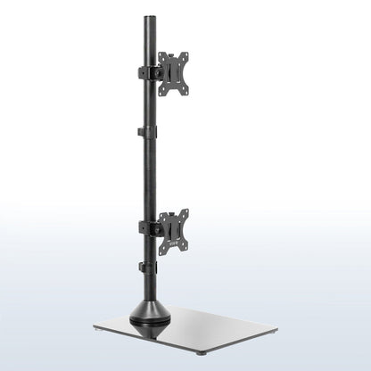 Tall dual monitor desk stand for stacked array with sturdy glass base.