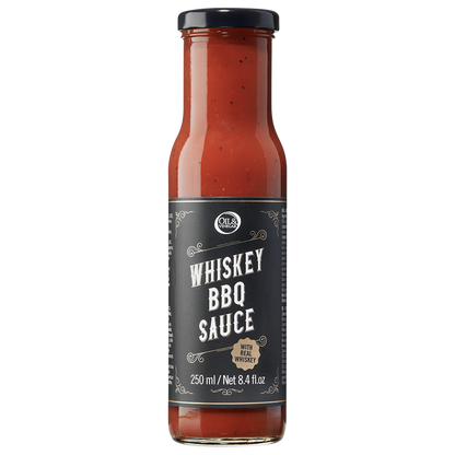 A bottle of Whiskey BBQ Sauce with a label showing the product name and volume.