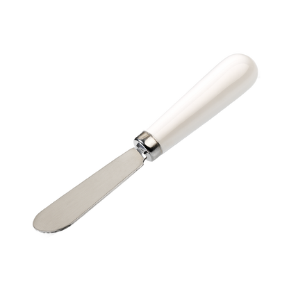 A stainless steel butter knife with a ceramic white handle.