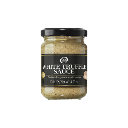Jar of white truffle sauce with a black lid