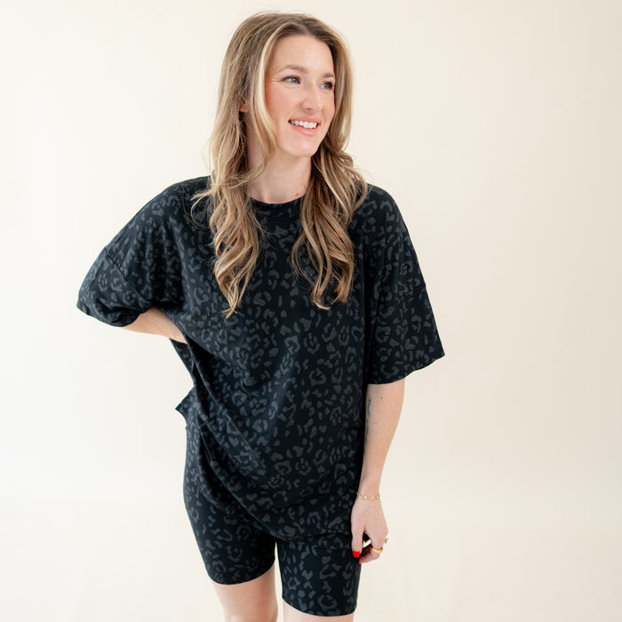 Woman modeling Women’s Biker Short Set in Midnight Leopard