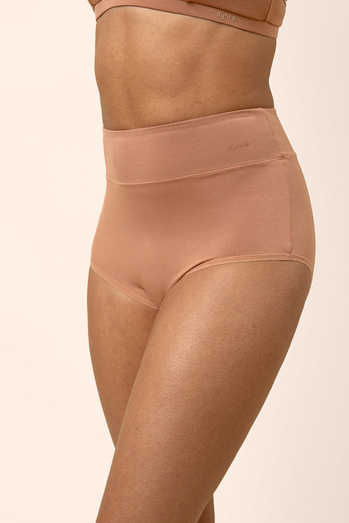 Women's High-Waisted Brief in Latte shown on a model