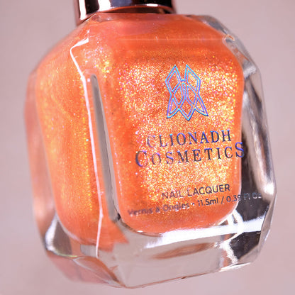 Close-up, angled shot of Yuzu Limonada Nail Lacquer bottle on a beige background.